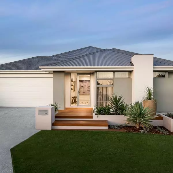 New home design by Atlantis Beach builders: a modern, stylish house with sleek lines and spacious interiors.